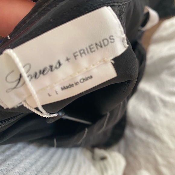 Lovers & Friends Black and White Striped Jumpsuit - Picture 4 of 4